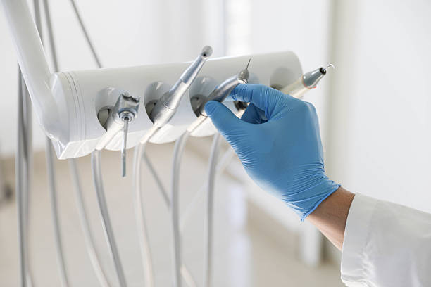 Professional Tooth Extraction technician working in Franklin, NC